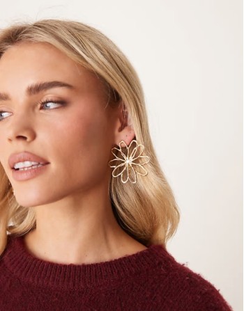 large flower stud earrings in gold
