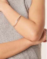fine multi interlocking bangles in sterling silver plated