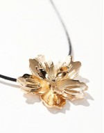 brushed flower cord necklace in gold