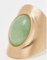 Curve long ring with faux sage stone set in brushed gold