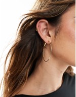waterproof stainless steel hoop earrings with skinny detail in gold tone