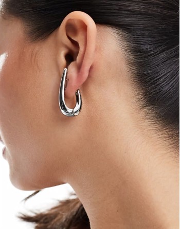 hoop earrings with spike clicker detail in silver tone