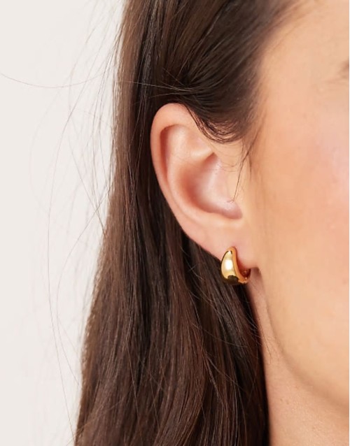 14k gold plated wide huggie hoops in gold tone
