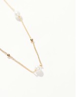 pearl and ball necklace in gold