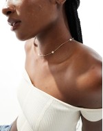 pearl and ball necklace in gold