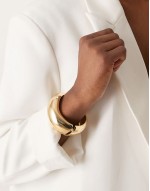 cuff bracelet with twist design in gold